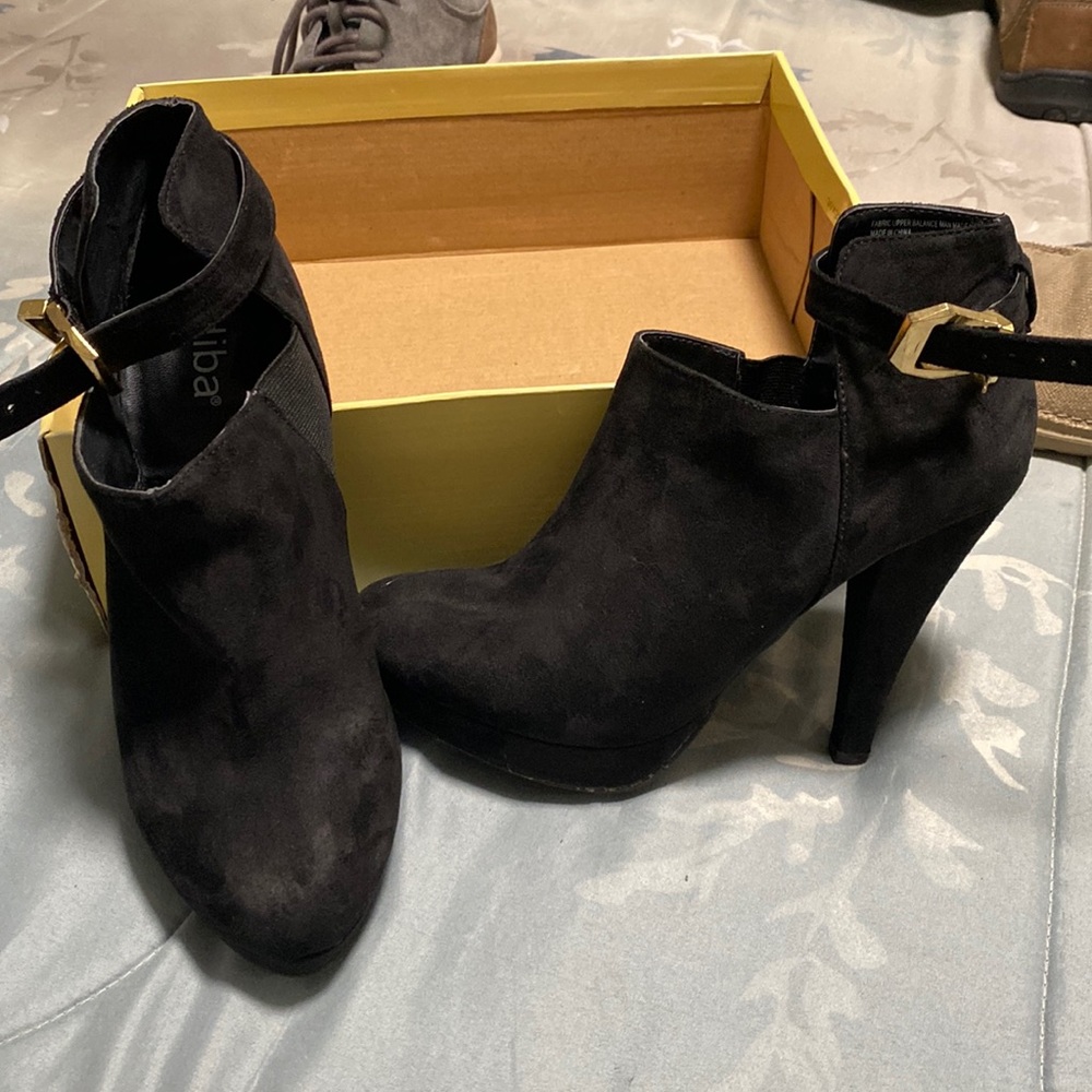 Gently used black booties